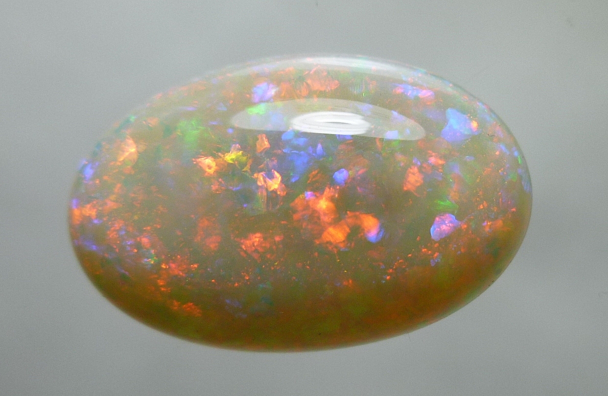 Opal gemstones, custom opal jewelry & cutting, custom opal jewelry, stones, Shamanic opal talisman, pendants healing meditation Australian Lambina Opal Lighting Ridge Opal Yowah Nut Opals Andamooka opal matrix opal Mintabie Boulder Airport Seven 7 Water Holes jelly Fire Honduran opal